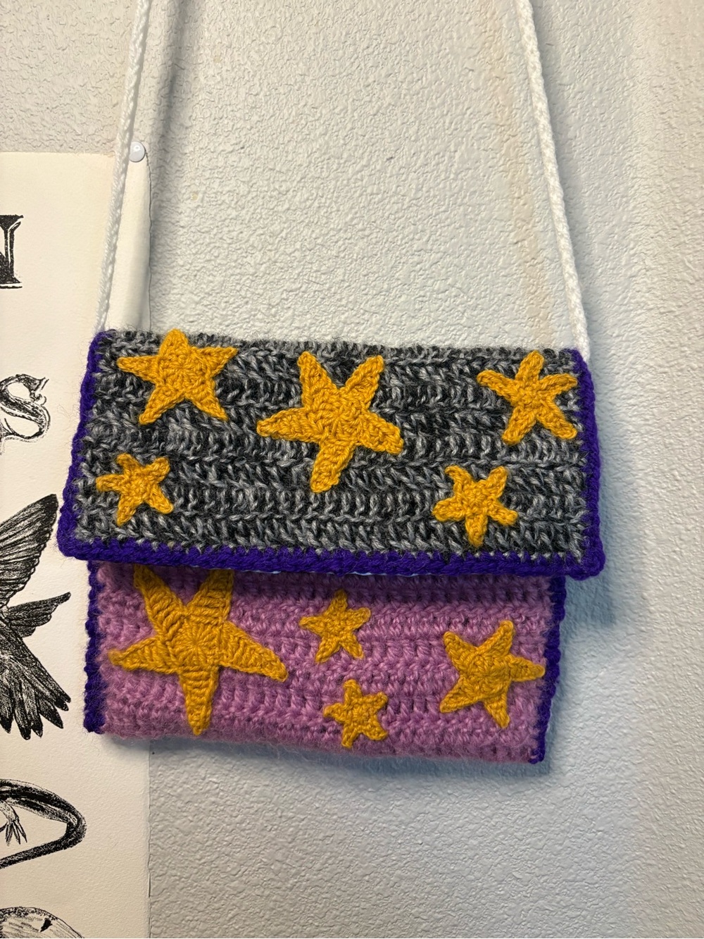 handmade “lowkey nonbinary” crocheted star crossbody bag
